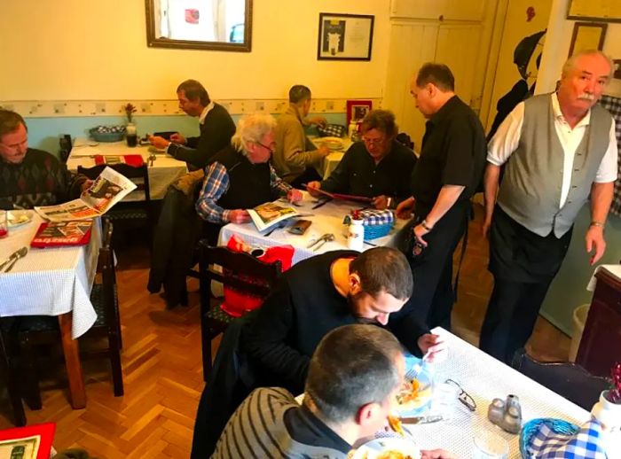 Customers gather in a cozy dining area.