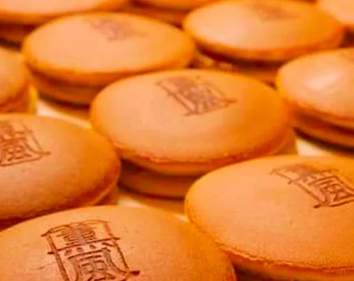 A platter of dorayaki, featuring the restaurant's logo.