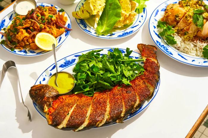 A beautifully plated fish dish at an elegant restaurant.