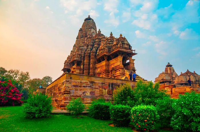 Golden light illuminating the Western Group of Temples in Khajuraho, India.