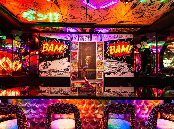 A vibrant restaurant interior adorned with neon lights, comic book-style “Bam!” motifs, and eclectic pop art.