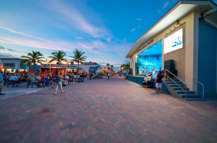 An outdoor music venue by the beach