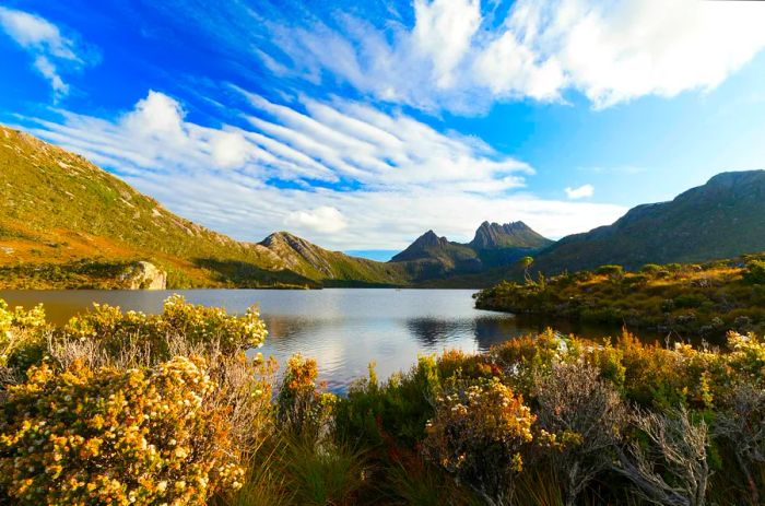 A serene lake framed by majestic mountains