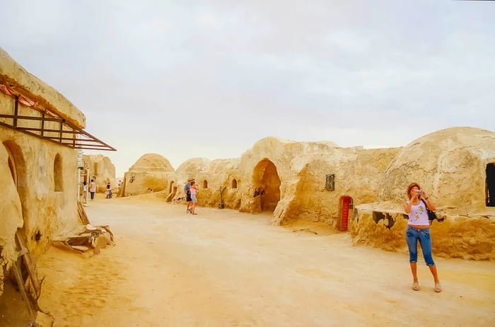 Visitors at the 'Star Wars' Tatooine movie set located in Mos Espa near Nefta.