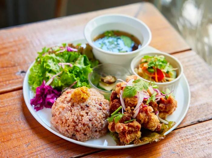 A colorful plate filled with various vegetable dishes.