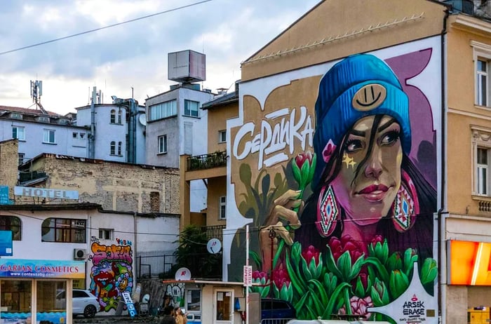 The vibrant “Tulip Girl” mural adorning the streets of Sofia, Bulgaria