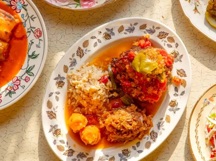 An assortment of Serbian dishes beautifully arranged on a decorative platter.