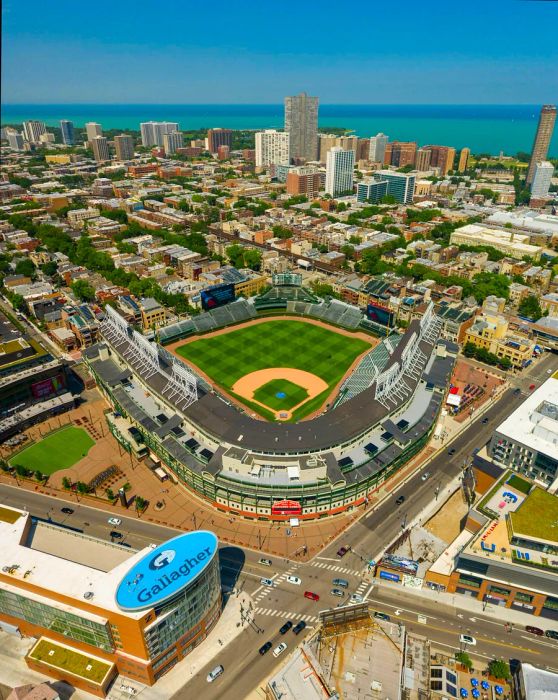 A view of Wrigley Field with Lake Michigan shimmering in the background.