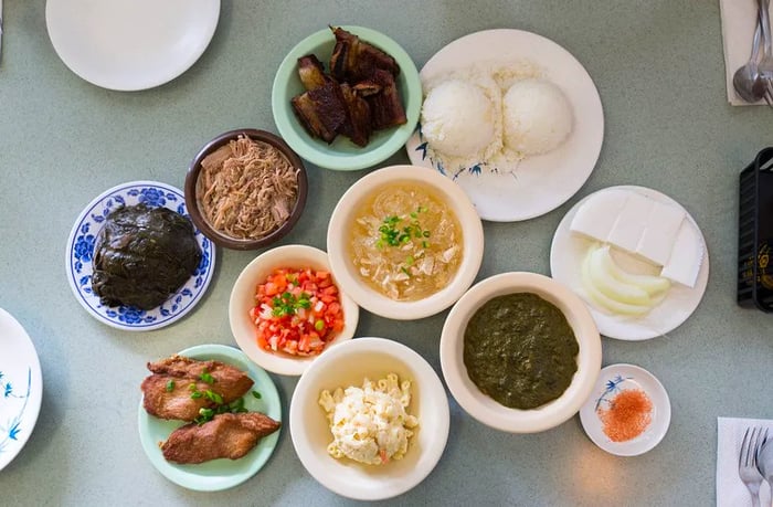 Aerial view of a table adorned with a variety of small dishes.