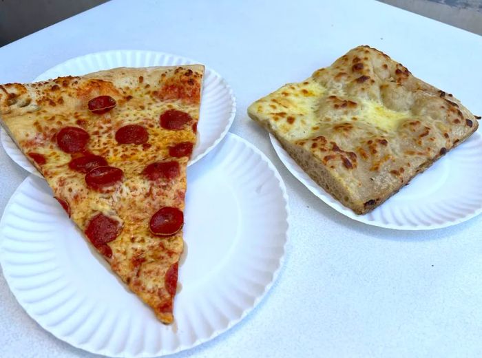 Two pizza slices on paper plates—one topped with pepperoni and the other a square cut.