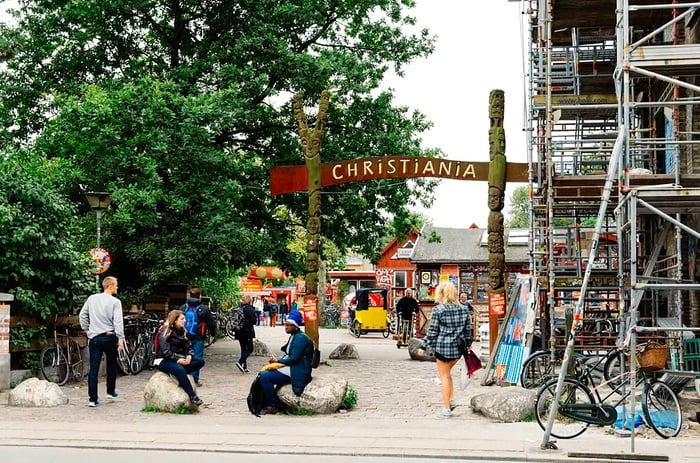 Visitors gather at the entrance of the autonomous community of Christiania.