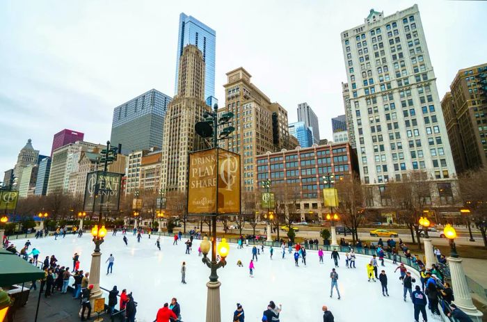 Skaters enjoying ice skating at McCormick Tribune Plaza in Chicago.