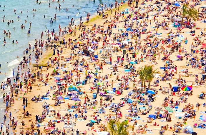 Crowds gather on Chicago's Oak Street Beach during the summer months.