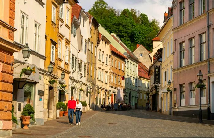 Visitors walking between Gornji trg and Levstikov trg in the historic center