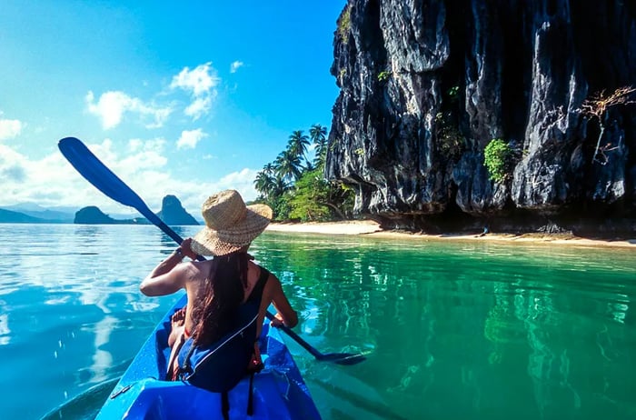 A kayaker discovers a secluded beach in El Nido, Philippines