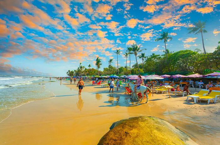 Families enjoying the beach in Hua Hin, Thailand