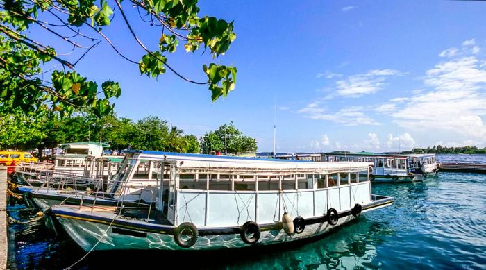 Passenger ferry dhoni boats in the harbor of North Malé atoll, Maldives.