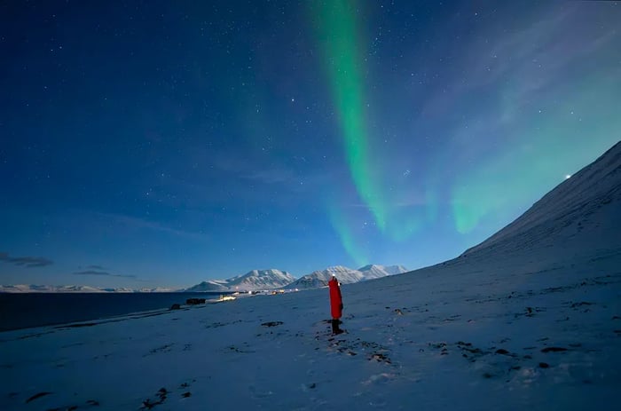 The Northern Lights glowing around 1 PM during Polar Night.