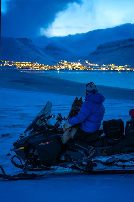 Cecilia and Grim gazing over Longyearbyen, Norway.