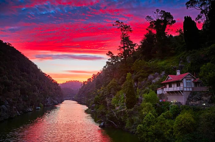 A vibrant sunset over Launceston and the gorge.