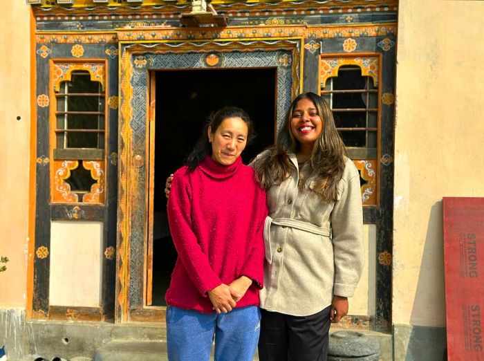 The author with her homestay host in Bhutan.