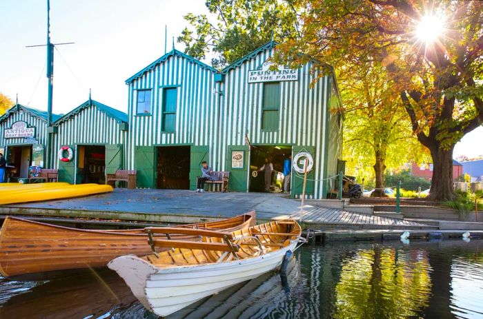 Boat sheds along the River Avon in Christchurch, New Zealand