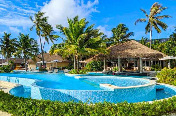 The swimming pool at InterContinental Maldives Maamunagau Resort