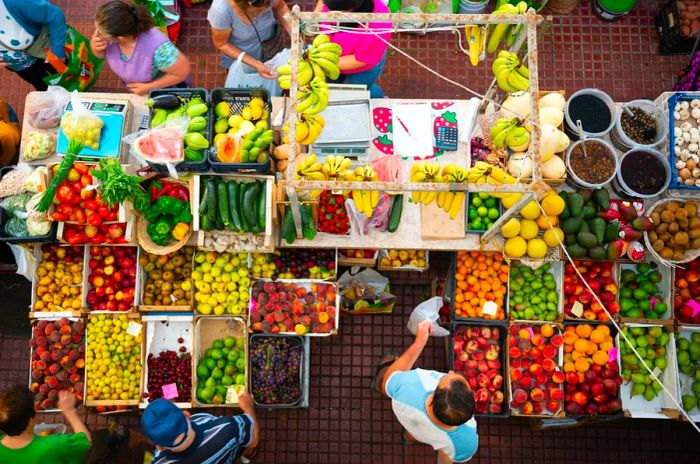 Aerial view of fruit and vegetable stalls at a Portuguese open market