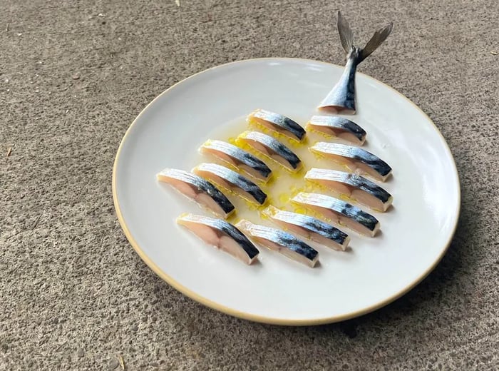 Fish fillets neatly sliced into small, geometric portions.