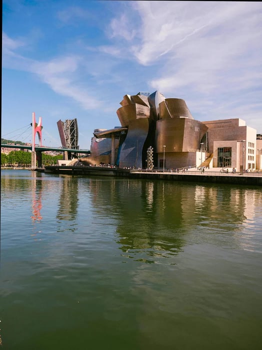 Bilbao, as seen from the Ribera market bridge, boasts a leisurely lifestyle and a deep appreciation for art.