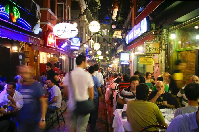 The vibrant restaurant and bar scene at night in Taksim, Istanbul, Turkey, captured on July 25, 2007. Taksim is a favored spot for both tourists and locals in Istanbul.