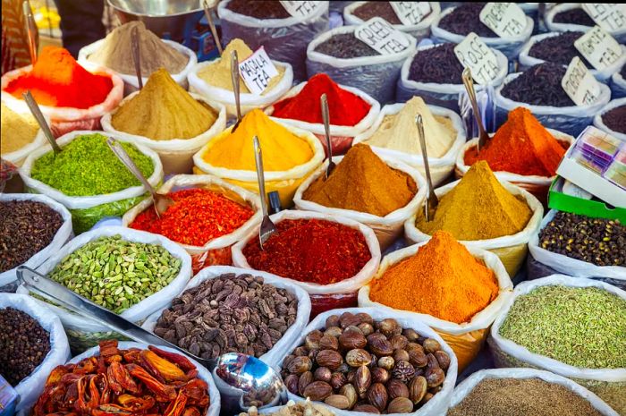 Vibrant spices showcased at the Anjuna flea market in Goa.