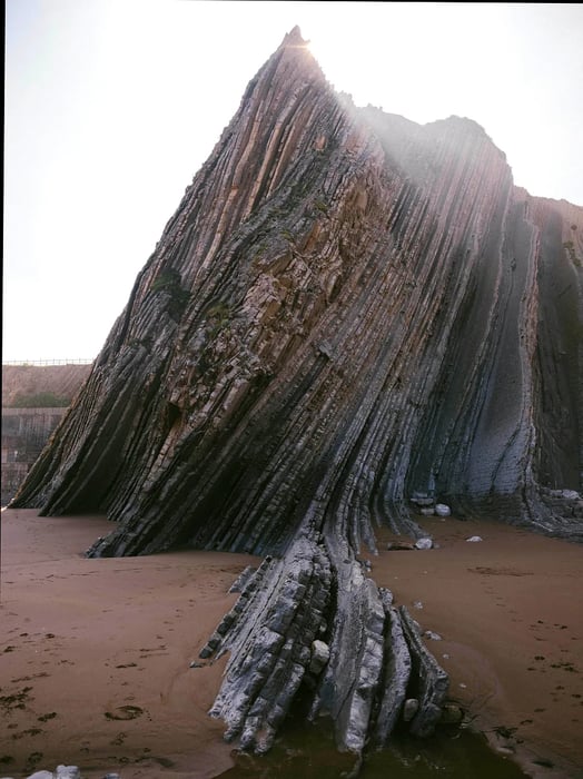 The Flysch Route along the Basque Coast features dramatic cliffs that reveal millions of years of geological history.