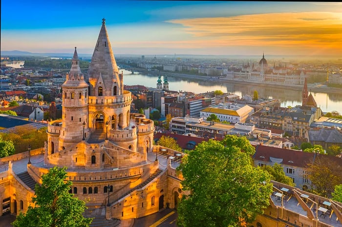 Gazing at Fisherman's Bastion at dawn, with the Danube in the background