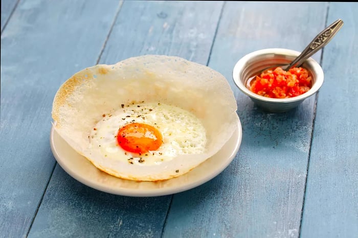 A plate of Sri Lankan egg hoppers (bittara aappa).