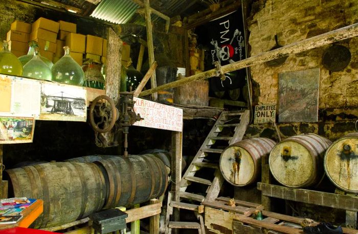 Rum barrels inside a workshop at Callwood Distillery in the BVI.