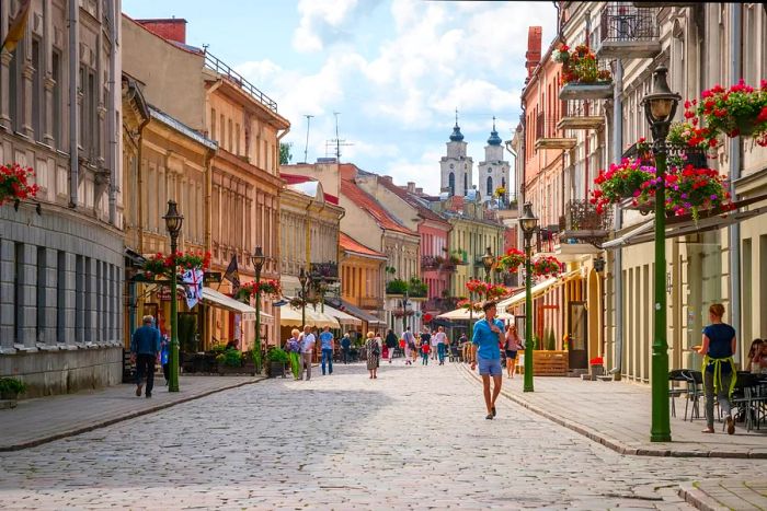 People stroll through the historic center of Kaunas, Lithuania