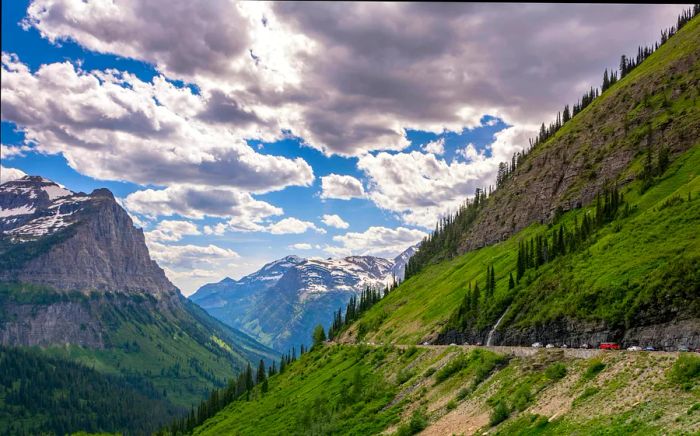 The Going-to-the-Sun Road is a stunning mountain route that winds through the Rocky Mountains in Glacier National Park, Montana.