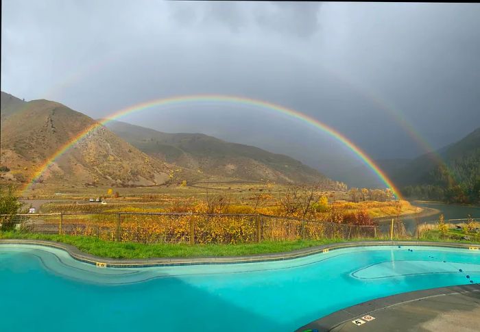 A stunning rainbow arcs over the Astoria Hot Springs in Wyoming.