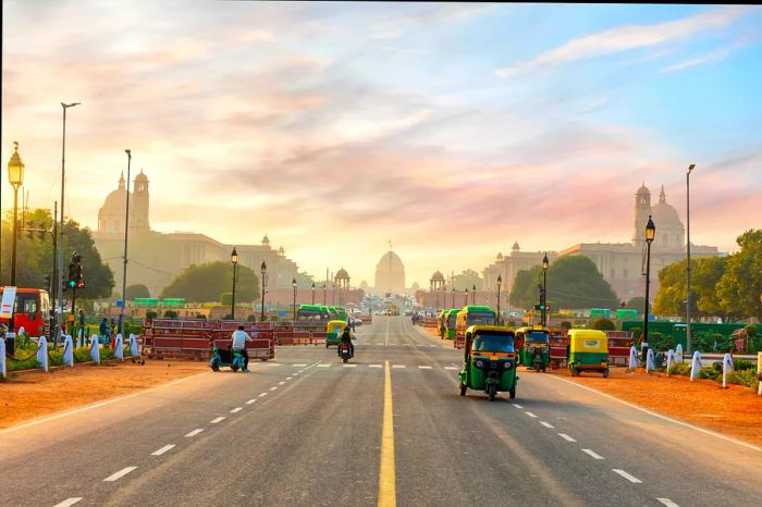 The road leading to the Presidential Residence, or Rashtrapati Bhavan, with autorickshaws sharing the route