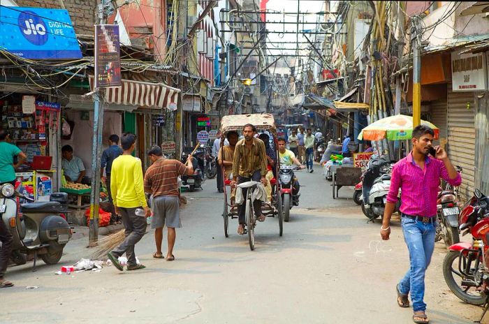 A bustling street in Old Delhi, which serves as the symbolic heart of metropolitan Delhi.