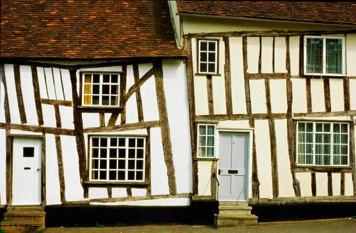 Two charmingly crooked timber-framed houses in Lavenham, England