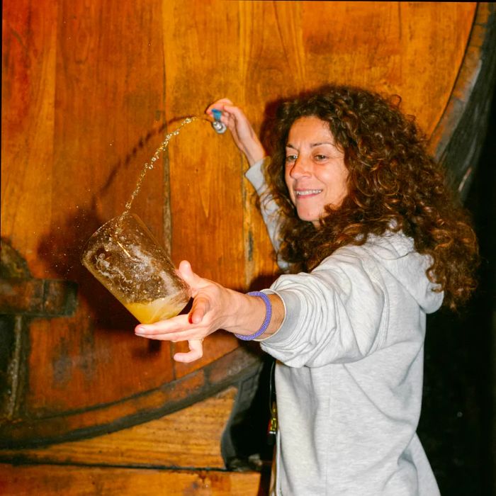 Pouring a cask of Green Spain's renowned cider.