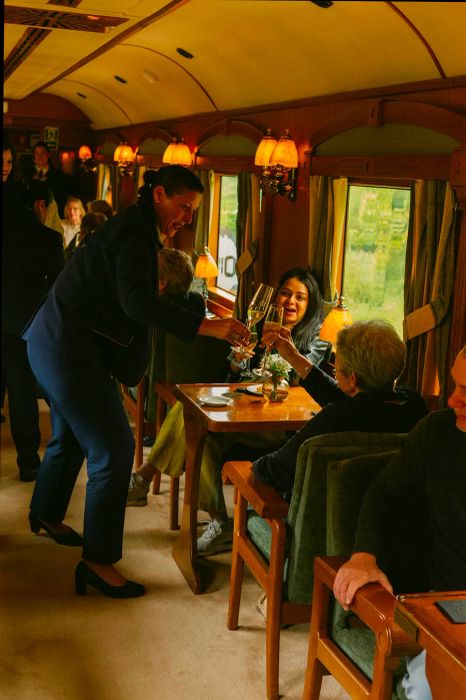 Begin your adventure with a glass of cava in the bar car...