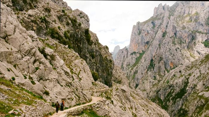 This trail is intricately carved into the cliffs of a stunning gorge.