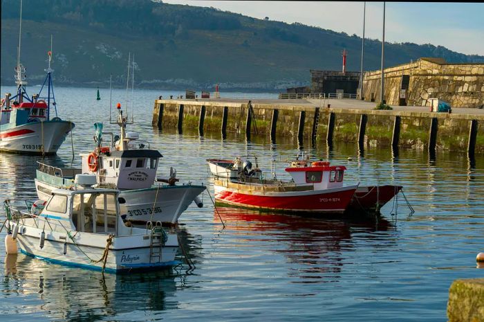 Percebeiros are ready to set sail from the fishing village of Corme, located on the Costa da Morte.