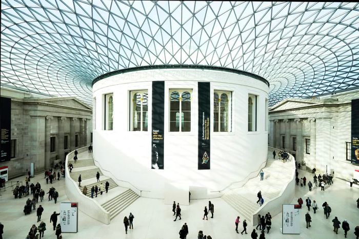 A spacious room featuring a curved glass ceiling.