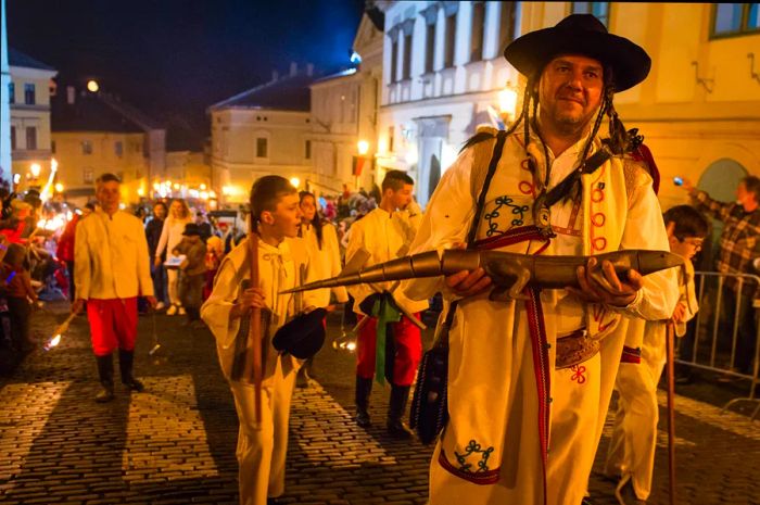 Participants in costume for the Salamander Day parade, Banská Štiavnica, Slovakia