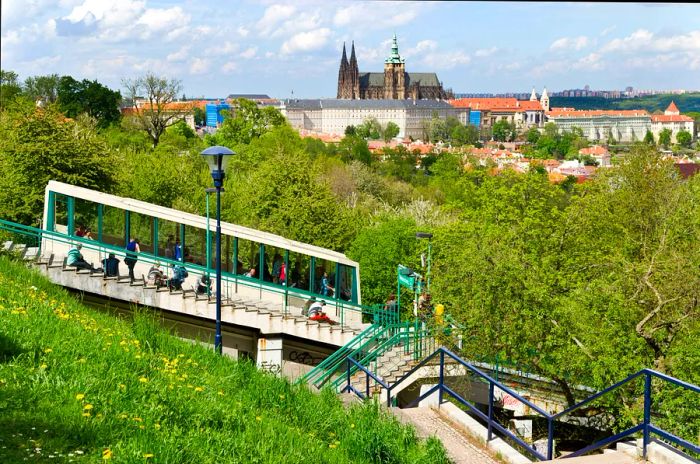 The funicular railway ascending Petřín hill, with the city skyline in the backdrop, Prague, Czech Republic