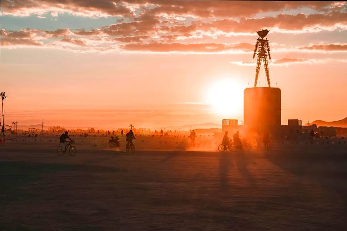 A sculpture in the desert at dawn during the Burning Man festival, Black Rock Desert, Nevada, USA